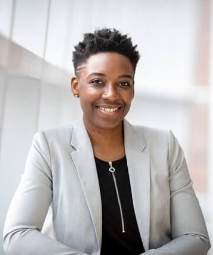 Woman Wearing Gray Notch Lapel Suit Jacket