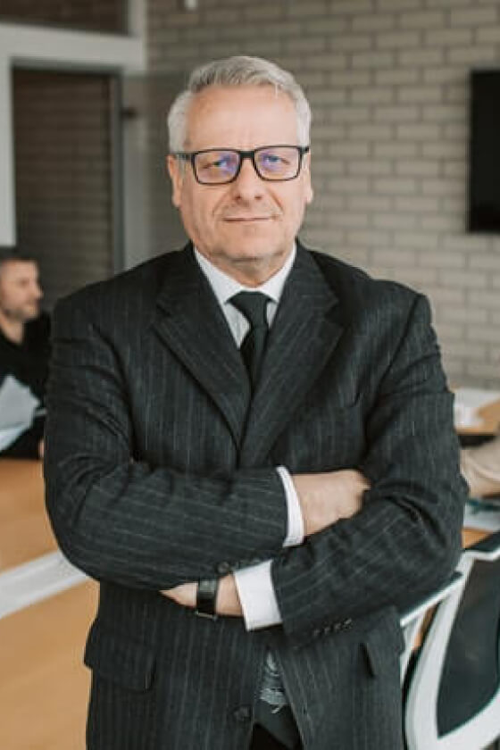 Elderly Man in Black Suit Jacket Standing