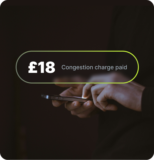 Person paying congestion charge on their phone