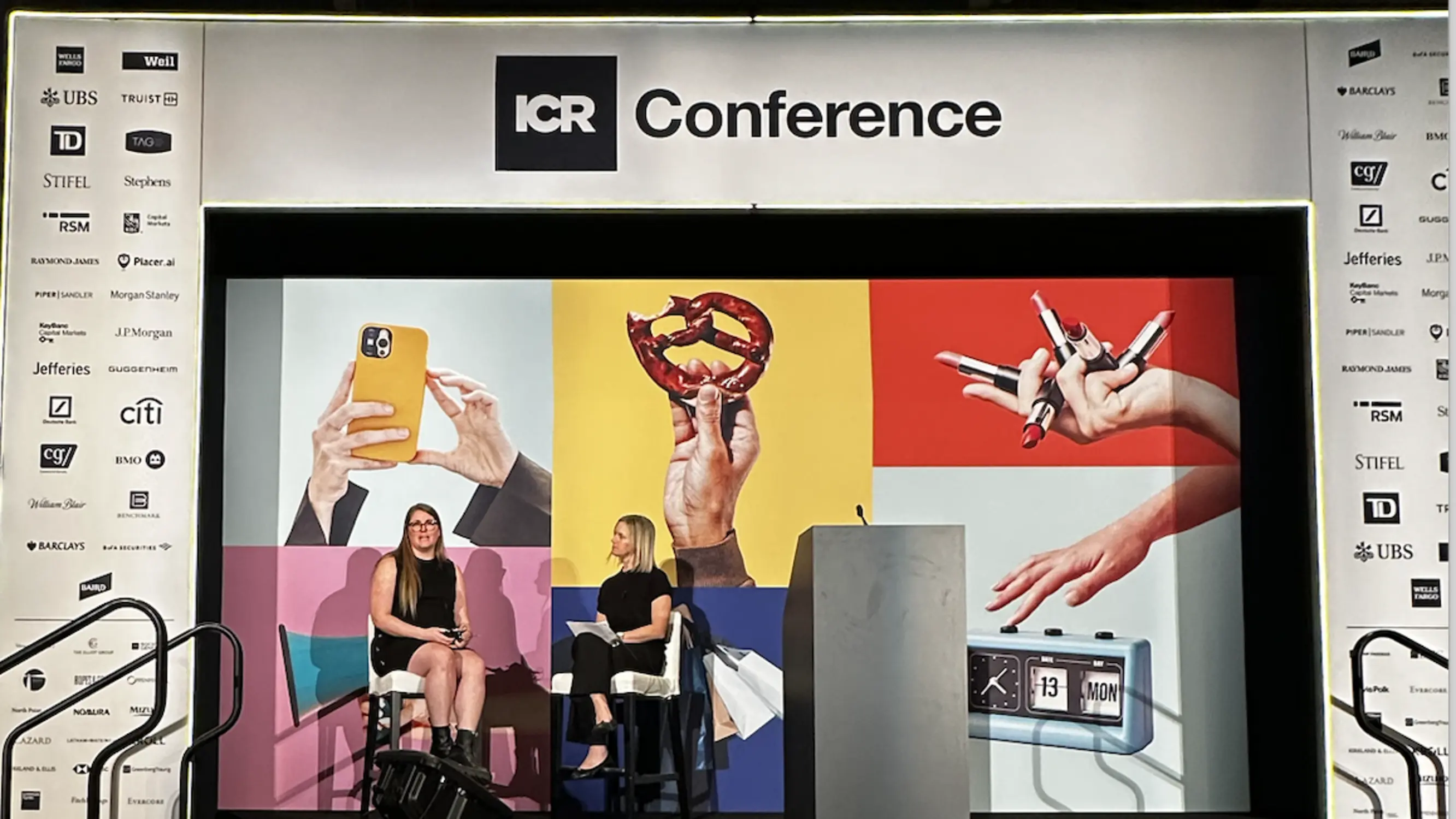 Image of the ICR conference stage with their stylized branding