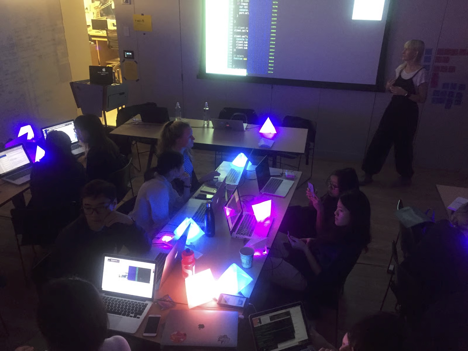 SVA MFA IxD classroom session with IoT pyramid lights