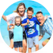 image_of_family_cheering_mother_and_three_kids_blue_background_deeded_review_testimonial_image