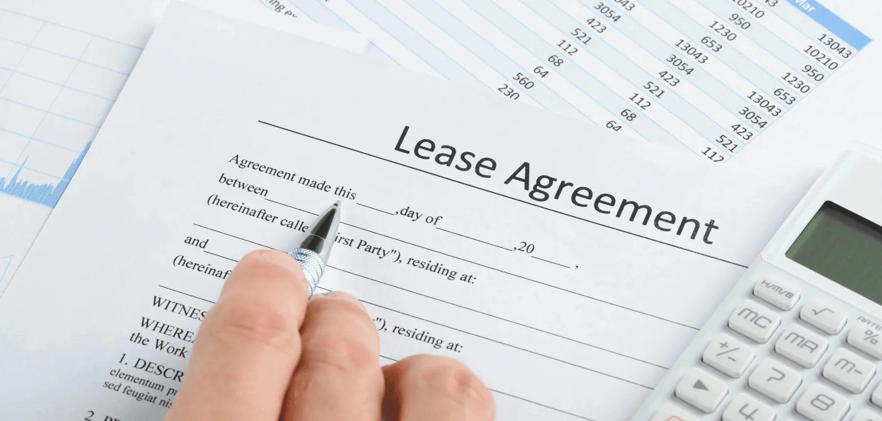 Lease agreement document being signed