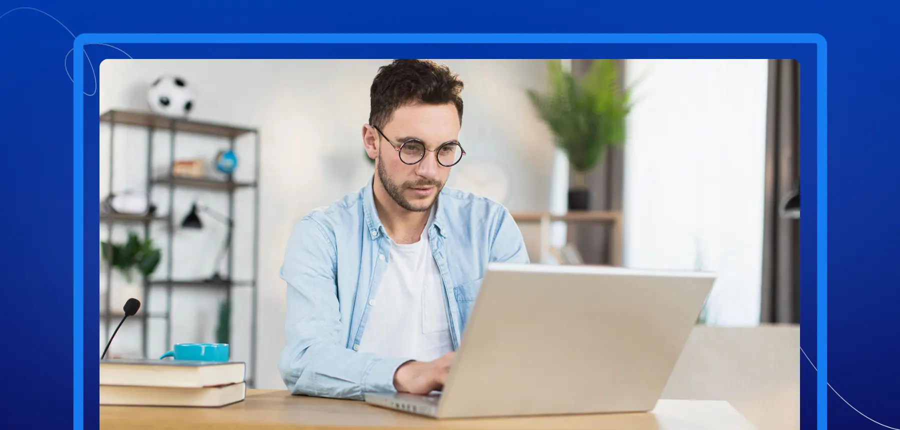 Man working on a laptop in a home office, representing users reviewing secure digital documents online.