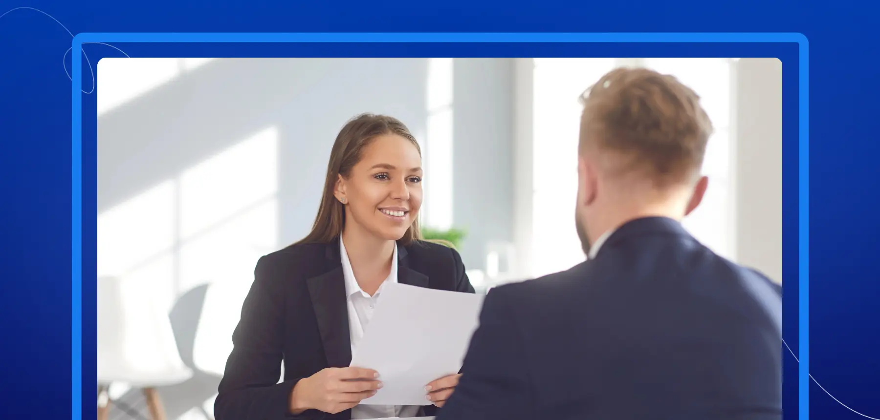 HR manager reviewing employee onboarding documents with a new hire during a paperless onboarding workflow and digital HR document signing process.