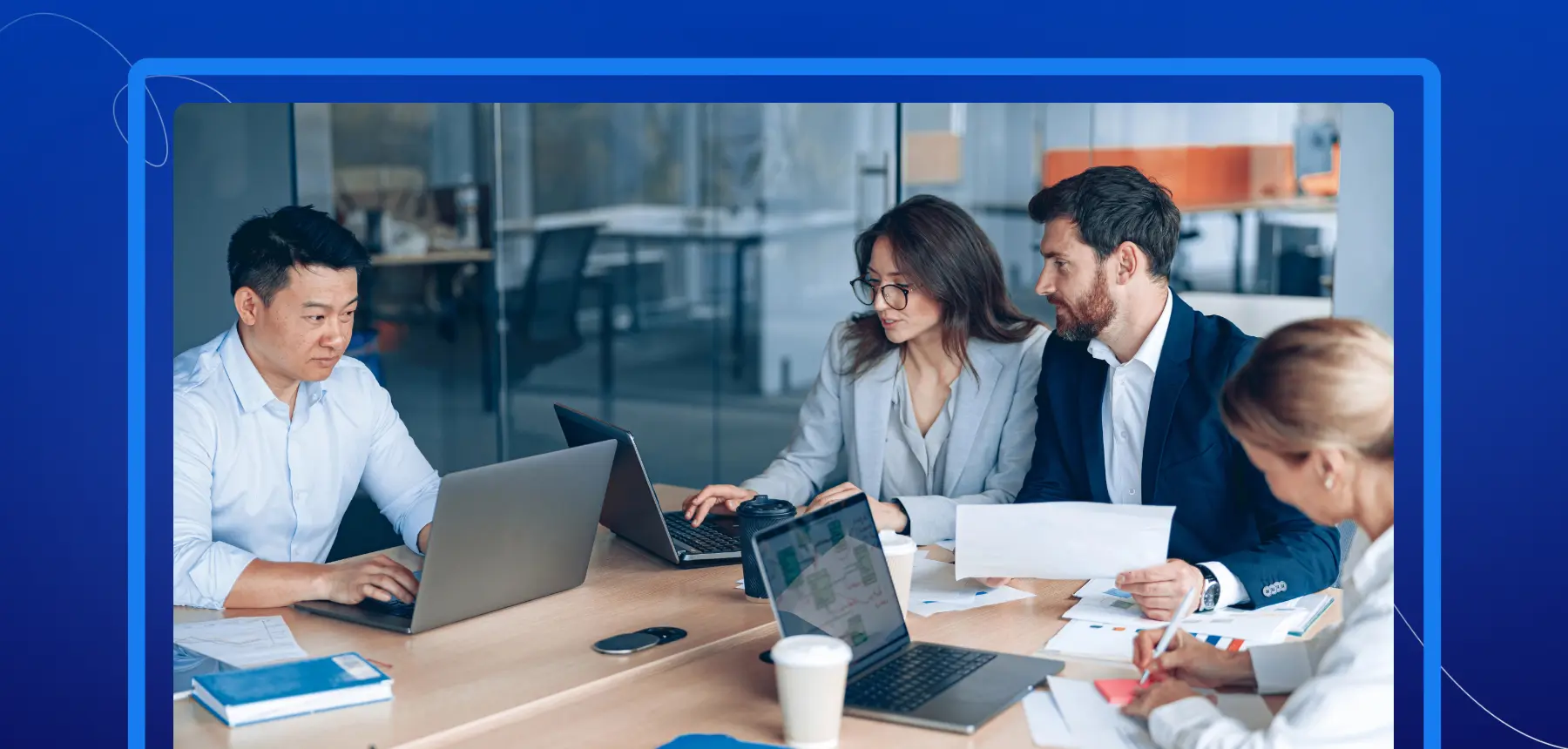 Business professionals collaborating on digital document workflows, representing how eSignatures improve operational efficiency, scalability, security, and workflow management for growing businesses.