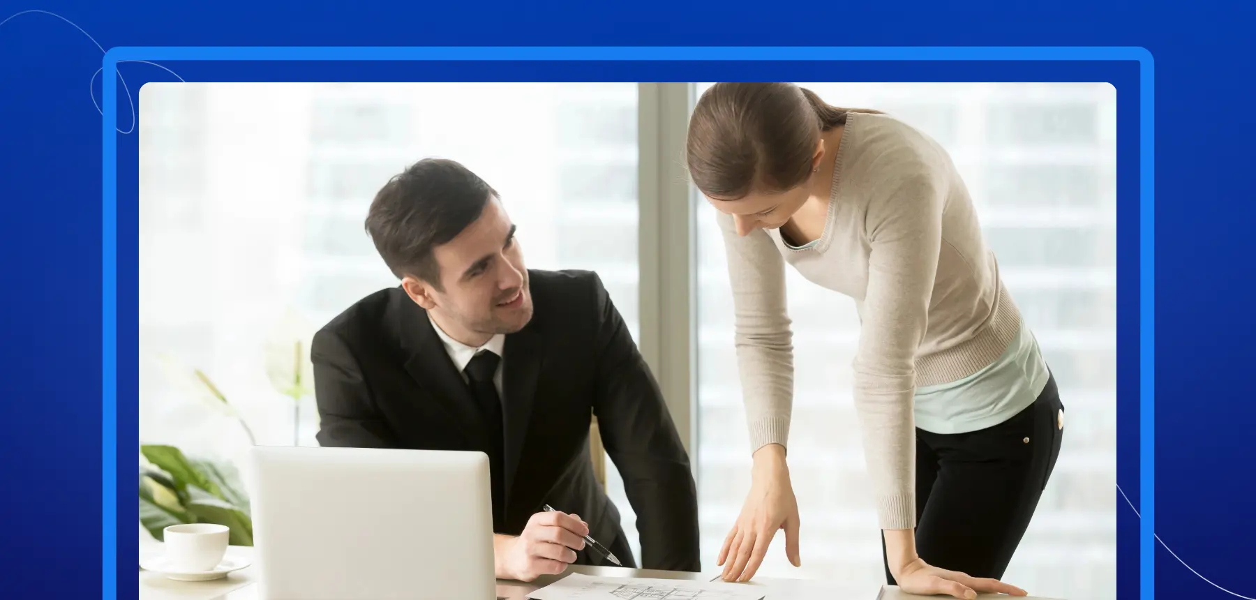 Real estate agent reviewing signing documents with a client using eSignature software
