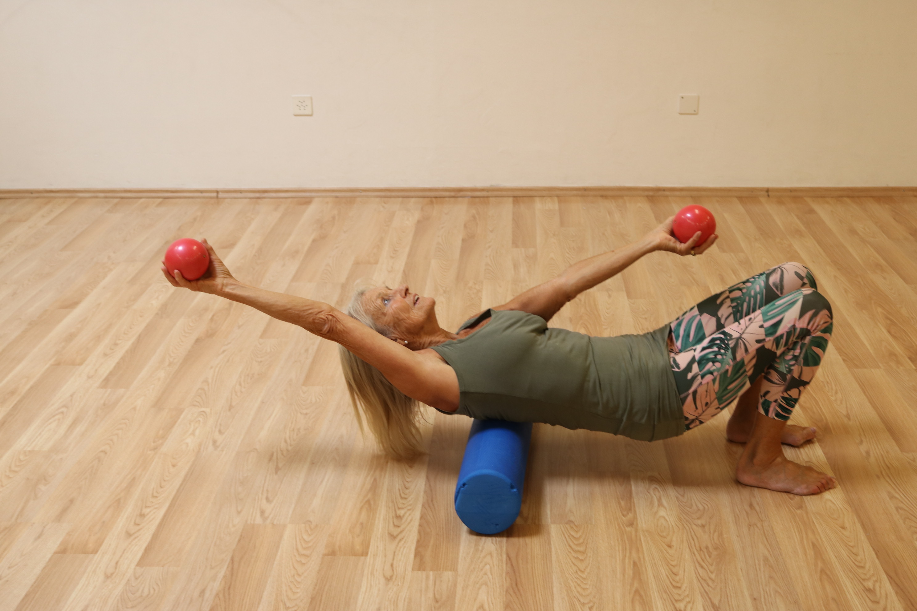 Esercizio dimostrativo su balancepad con pesetti rossi