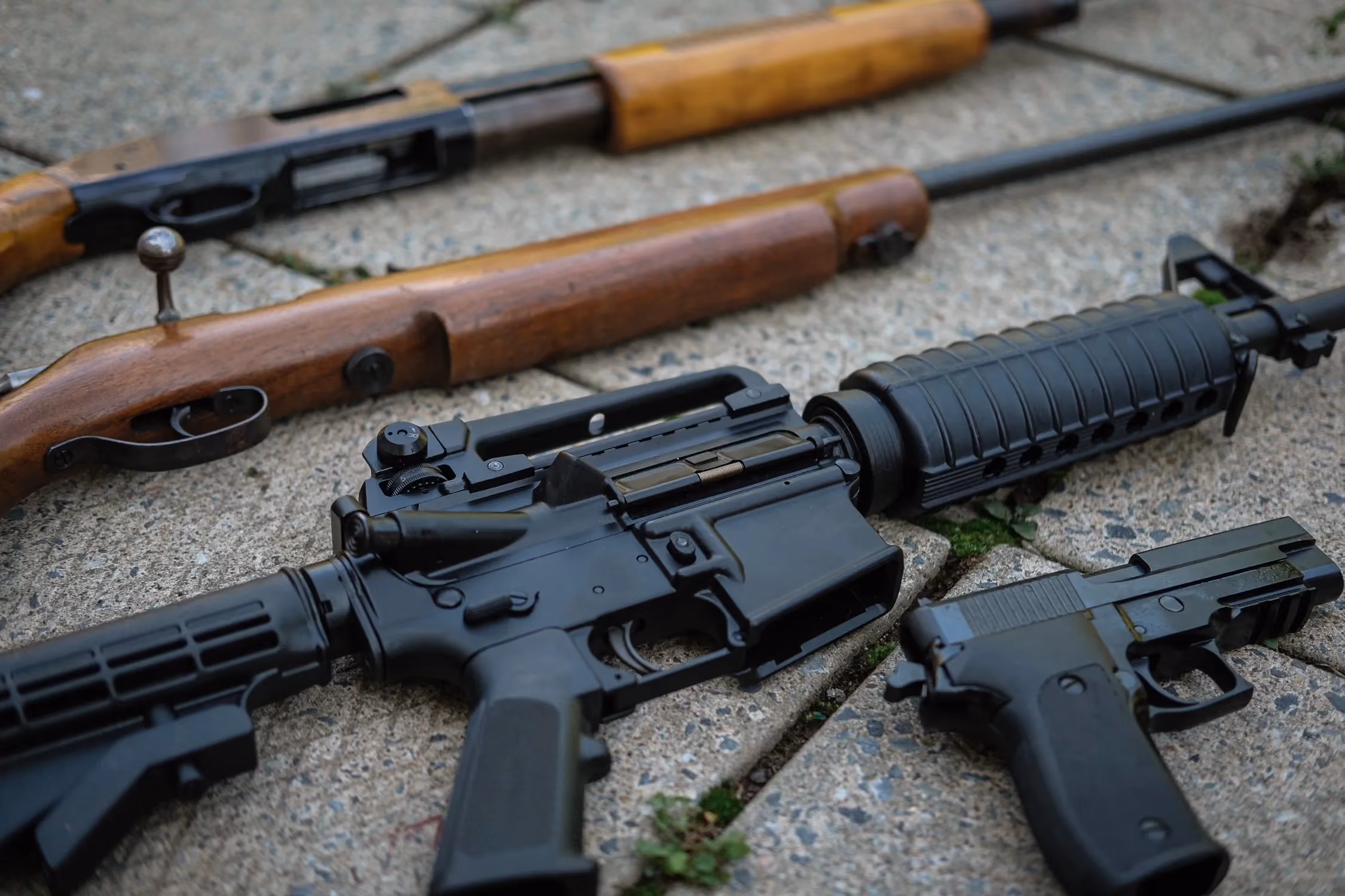 What do the parties propose when it comes to firearms?