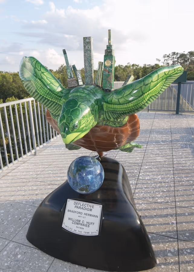 WILLIAM C. HUFF DONATES TURTLE SCULPTURE TO ROOKERY BAY RESERVE