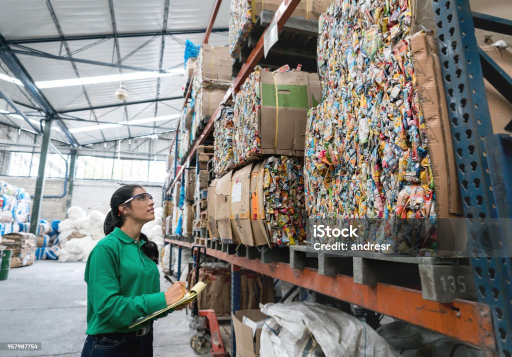 Technician in a mask smiles, breathing easy with GMG’s air quality standards
