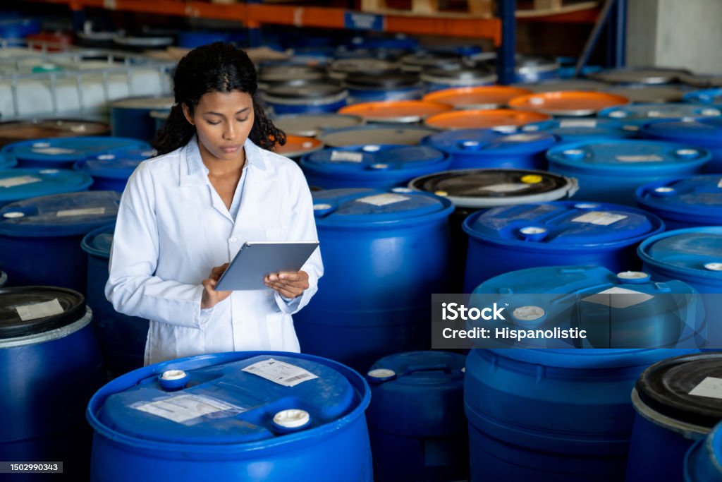 Technician in a mask smiles, breathing easy with GMG’s air quality standards
