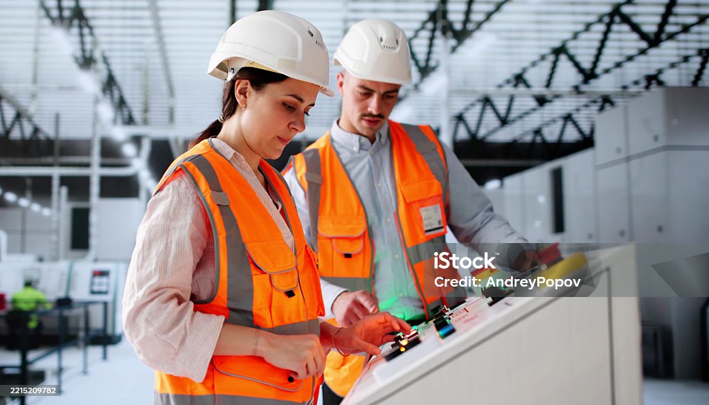 Mechanic responsibly refilling fluids, mindful of GMG's hazardous material protocols