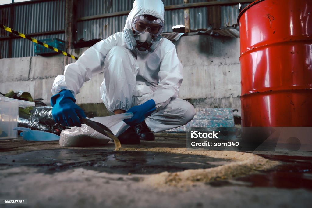 Mechanic checks car undercarriage in GMG-compliant noise-controlled workshop