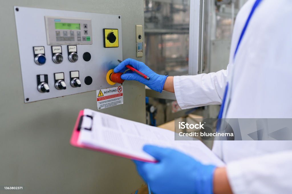 Technician in a mask smiles, breathing easy with GMG’s air quality standards