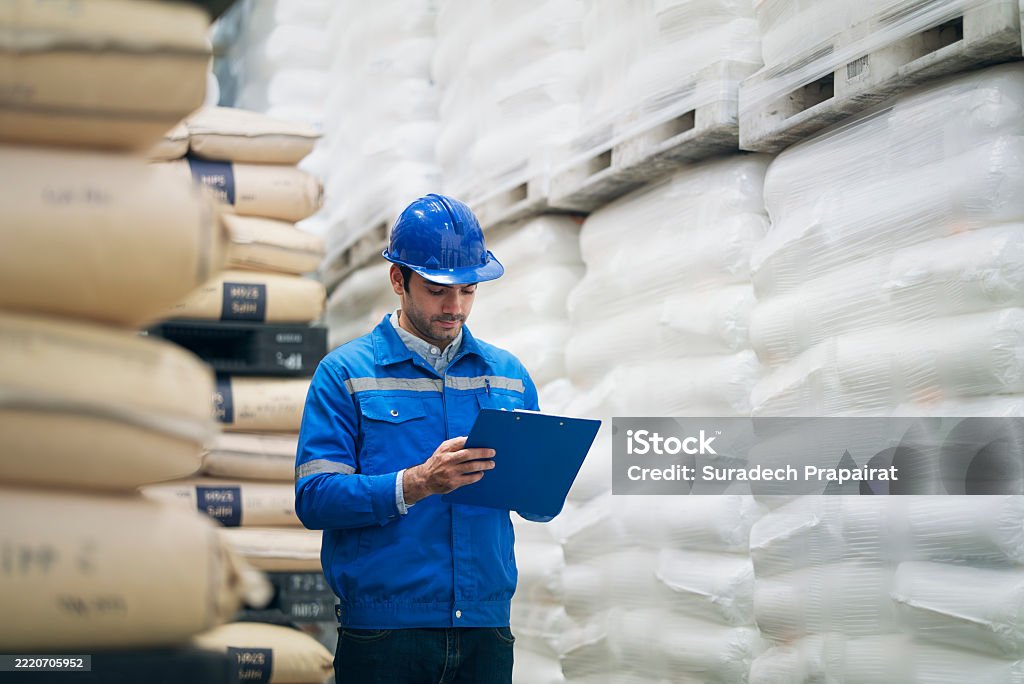 Technician in a mask smiles, breathing easy with GMG’s air quality standards