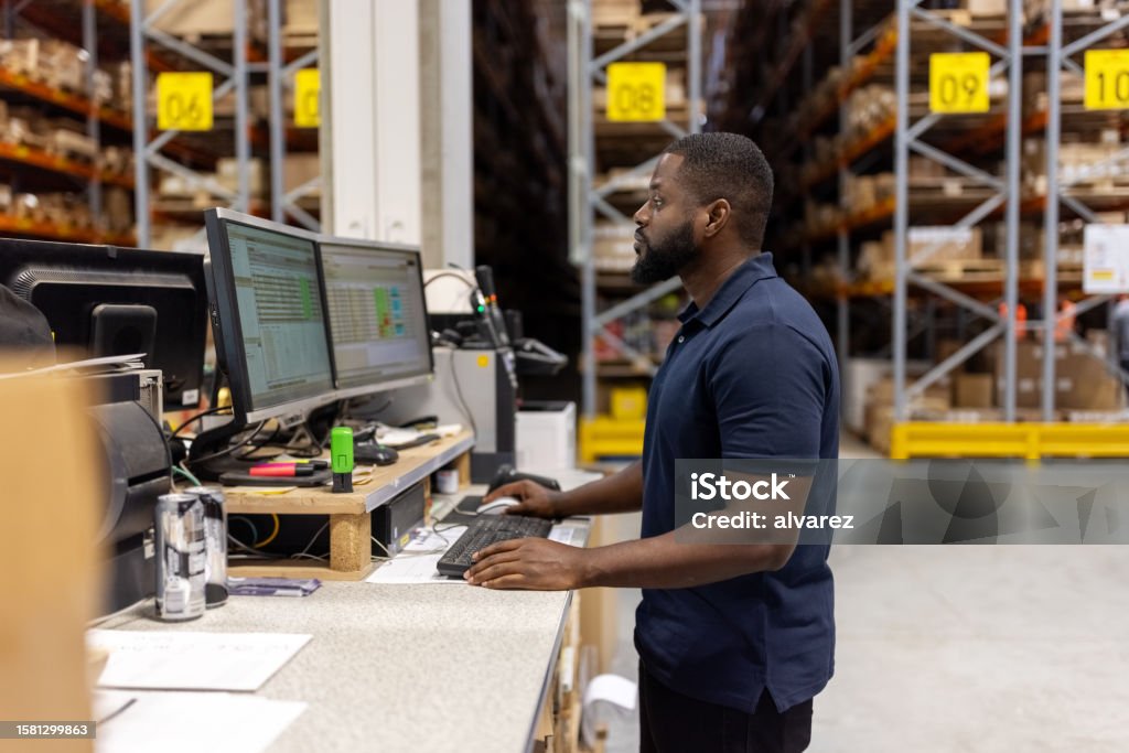 Technician in a mask smiles, breathing easy with GMG’s air quality standards