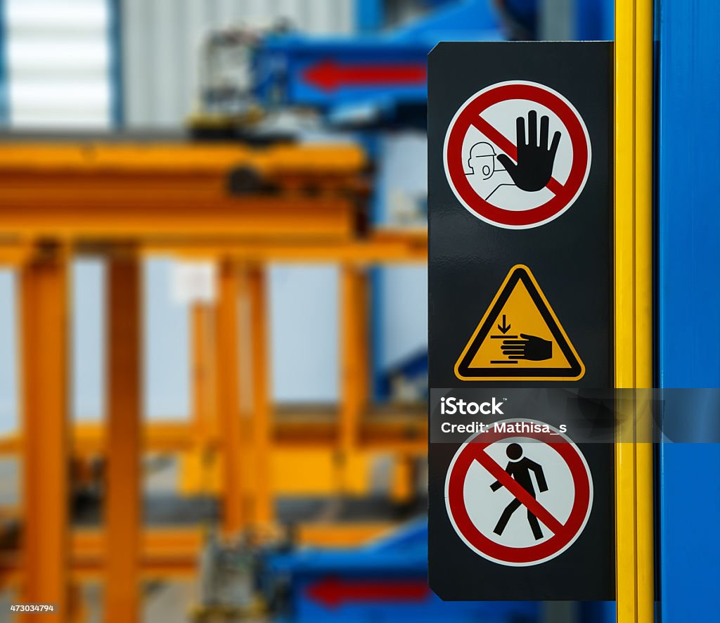 Mechanic checks car undercarriage in GMG-compliant noise-controlled workshop