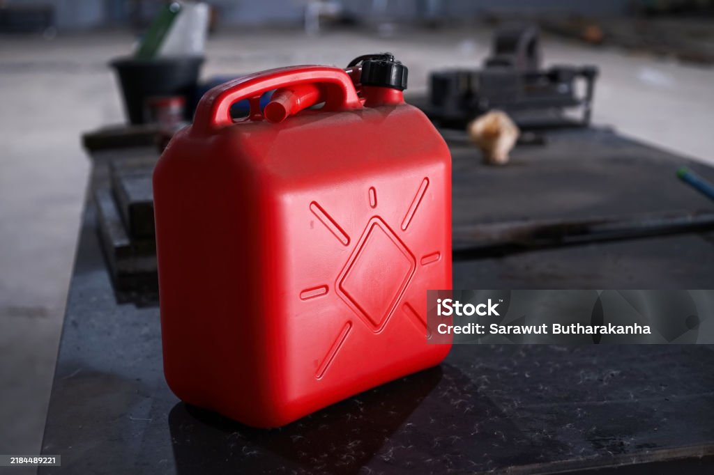 Mechanic checks car undercarriage in GMG-compliant noise-controlled workshop
