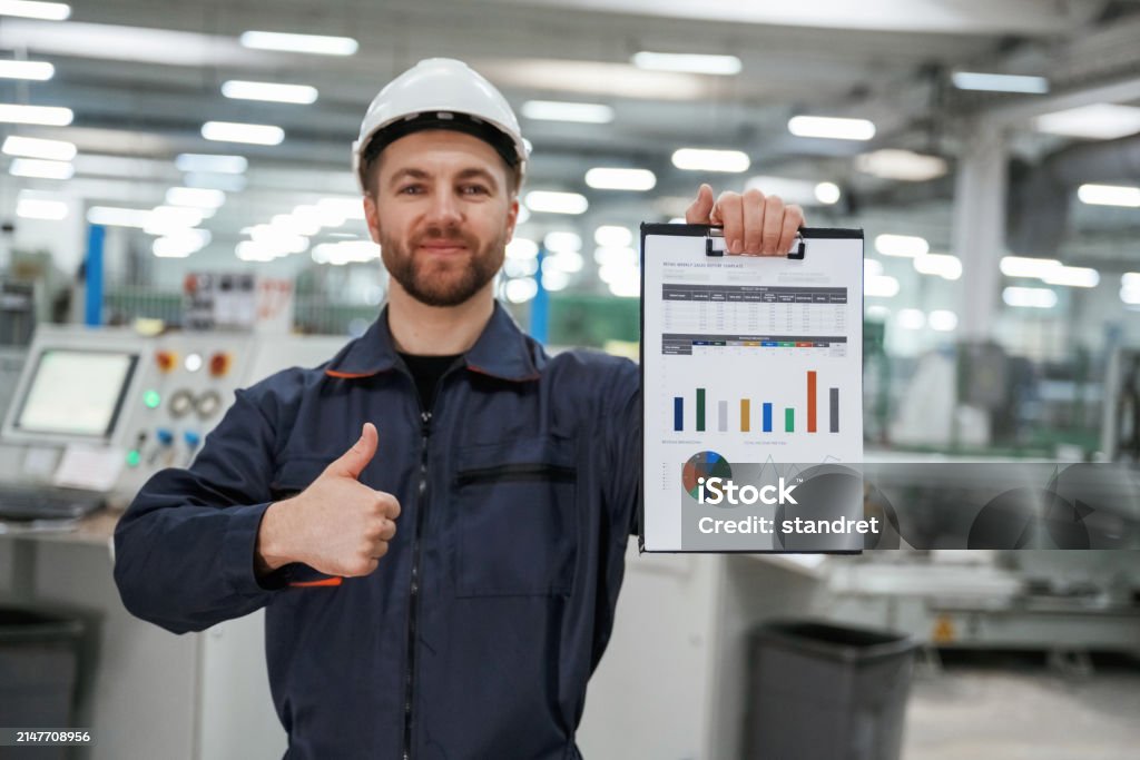 Technician in a mask smiles, breathing easy with GMG’s air quality standards