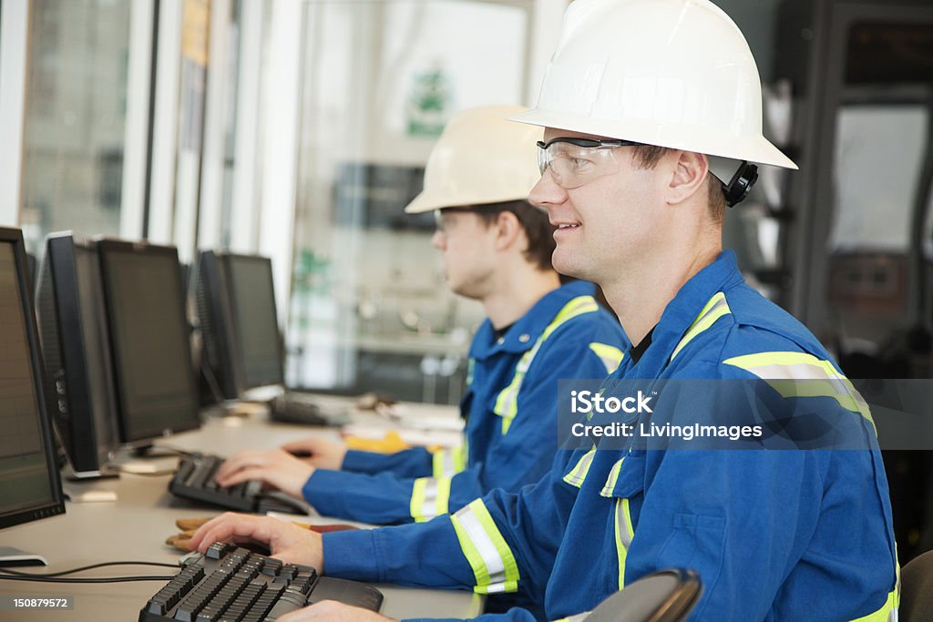 Technician in a mask smiles, breathing easy with GMG’s air quality standards