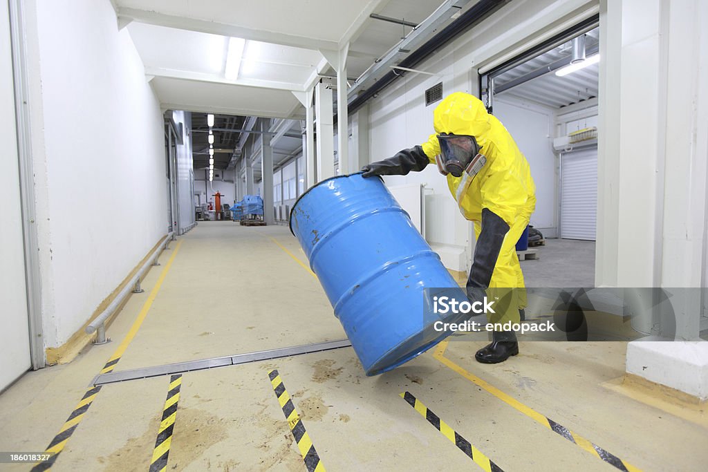 EHS-trained welder practicing fire prevention in a collision repair shop