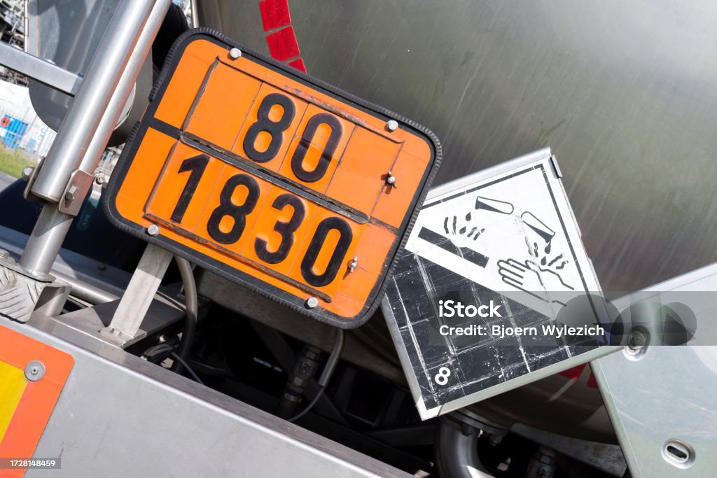 Mechanic checks car undercarriage in GMG-compliant noise-controlled workshop