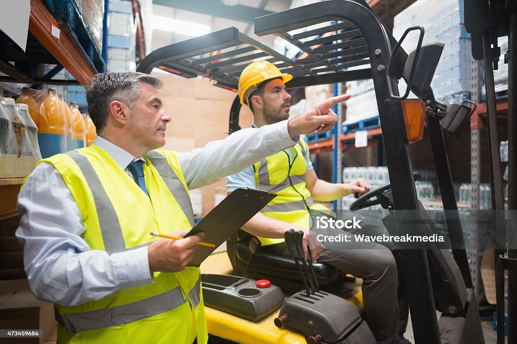 Technician in a mask smiles, breathing easy with GMG’s air quality standards