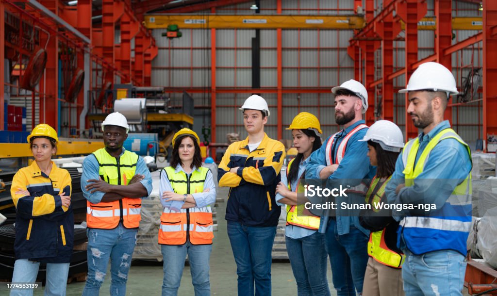Technician in a mask smiles, breathing easy with GMG’s air quality standards