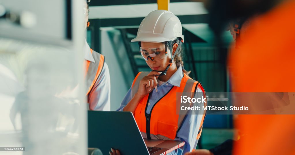 Technician in a mask smiles, breathing easy with GMG’s air quality standards