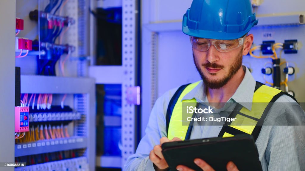 Technician in a mask smiles, breathing easy with GMG’s air quality standards