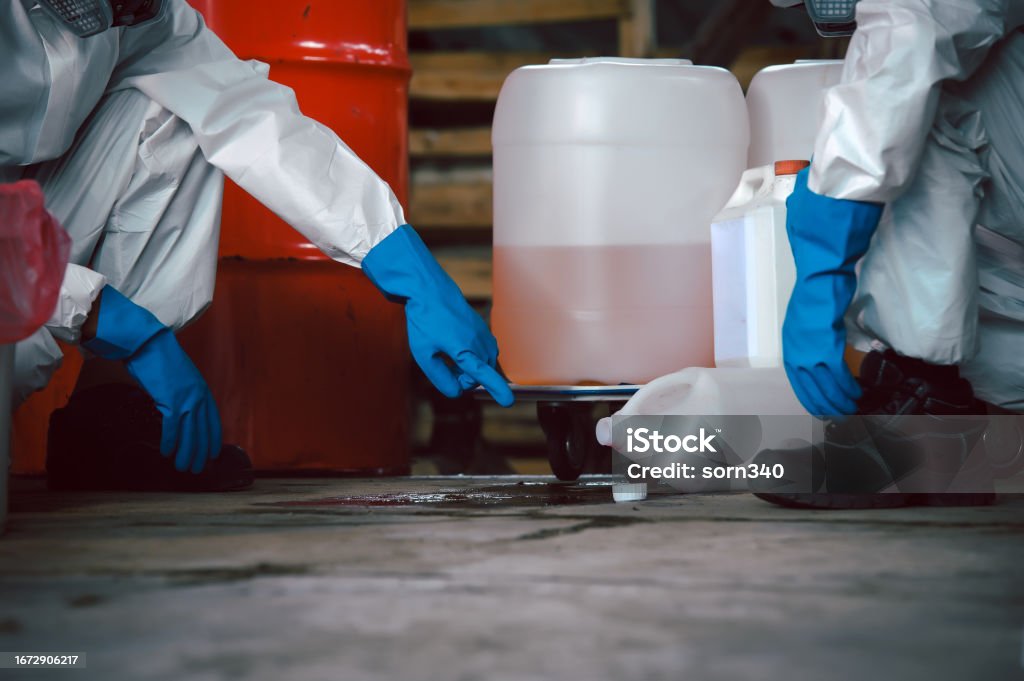 Technician in a mask smiles, breathing easy with GMG’s air quality standards