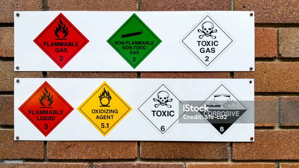 Technician in a mask smiles, breathing easy with GMG’s air quality standards