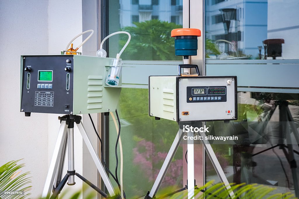 Technician in a mask smiles, breathing easy with GMG’s air quality standards