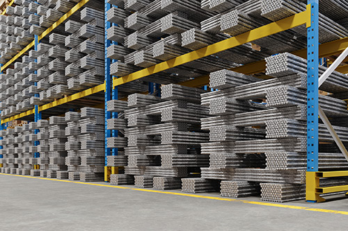 Technician in a mask smiles, breathing easy with GMG’s air quality standards