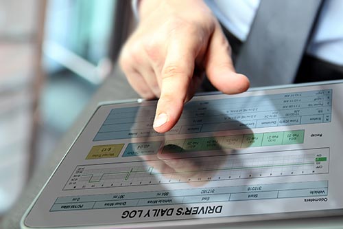 Technician in a mask smiles, breathing easy with GMG’s air quality standards