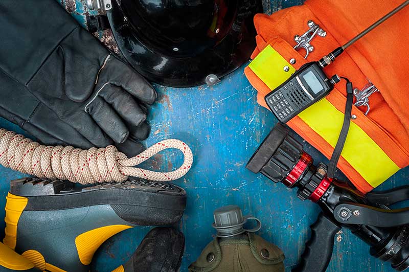 Mechanic checks car undercarriage in GMG-compliant noise-controlled workshop