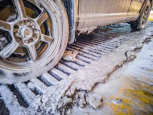 Focused technician conducts EHS risk testing of commercial printing equiopment with GMG EnviroSafe support