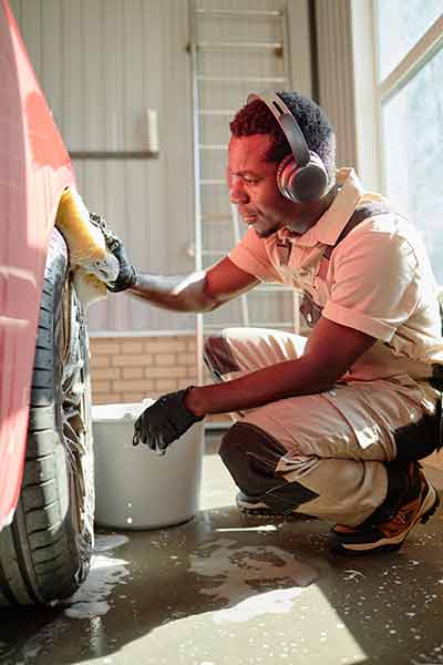 Colorful printing press rollers operating safely due to GMG EnviroSafe compliance FAQs