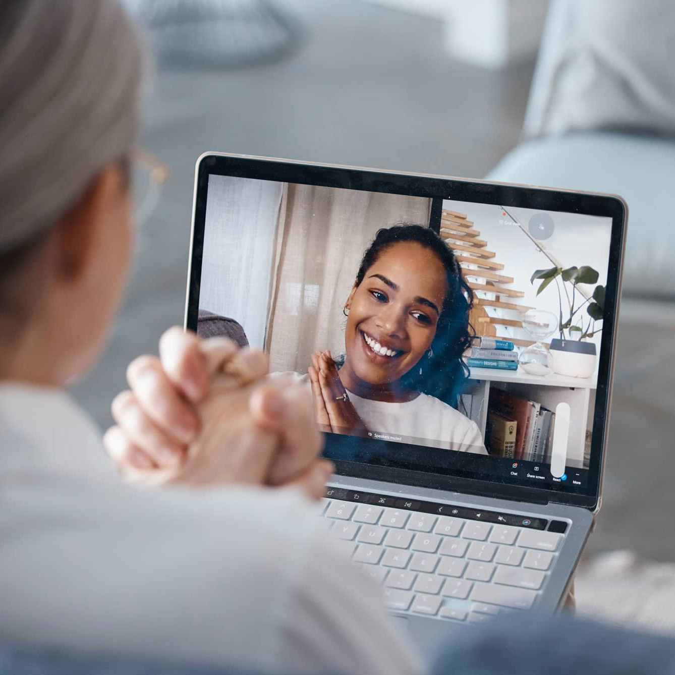 A client attends a virtual therapy session through secure online counseling, connecting with a therapist from home via telehealth.