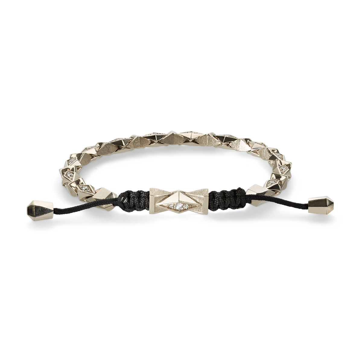 The Chiliagon collection combines bold shapes with timeless elegance. Inspired by avant-garde architecture, these pieces of jewellery mesmerizingly reflect the light, unfolding their captivating effect. This exquisite bracelet is handcrafted in white gold and features radiant brilliant-cut diamonds. It pairs effortlessly with any style and occasion, and thanks to its adjustable sliding-knot closure, it gently hugs every wrist.