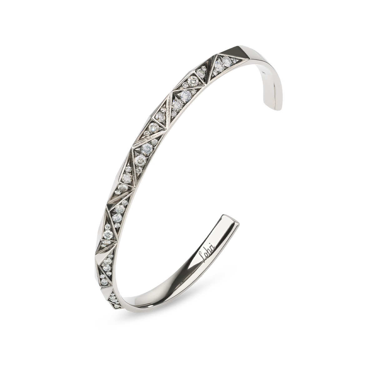 The Chiliagon collection combines bold shapes with timeless elegance. Inspired by avant-garde architecture, these pieces of jewellery mesmerizingly reflect the light, unfolding their captivating effect. This bracelet, handcrafted in white gold, features diamonds that shimmer in a delicate gradient from white to grey.