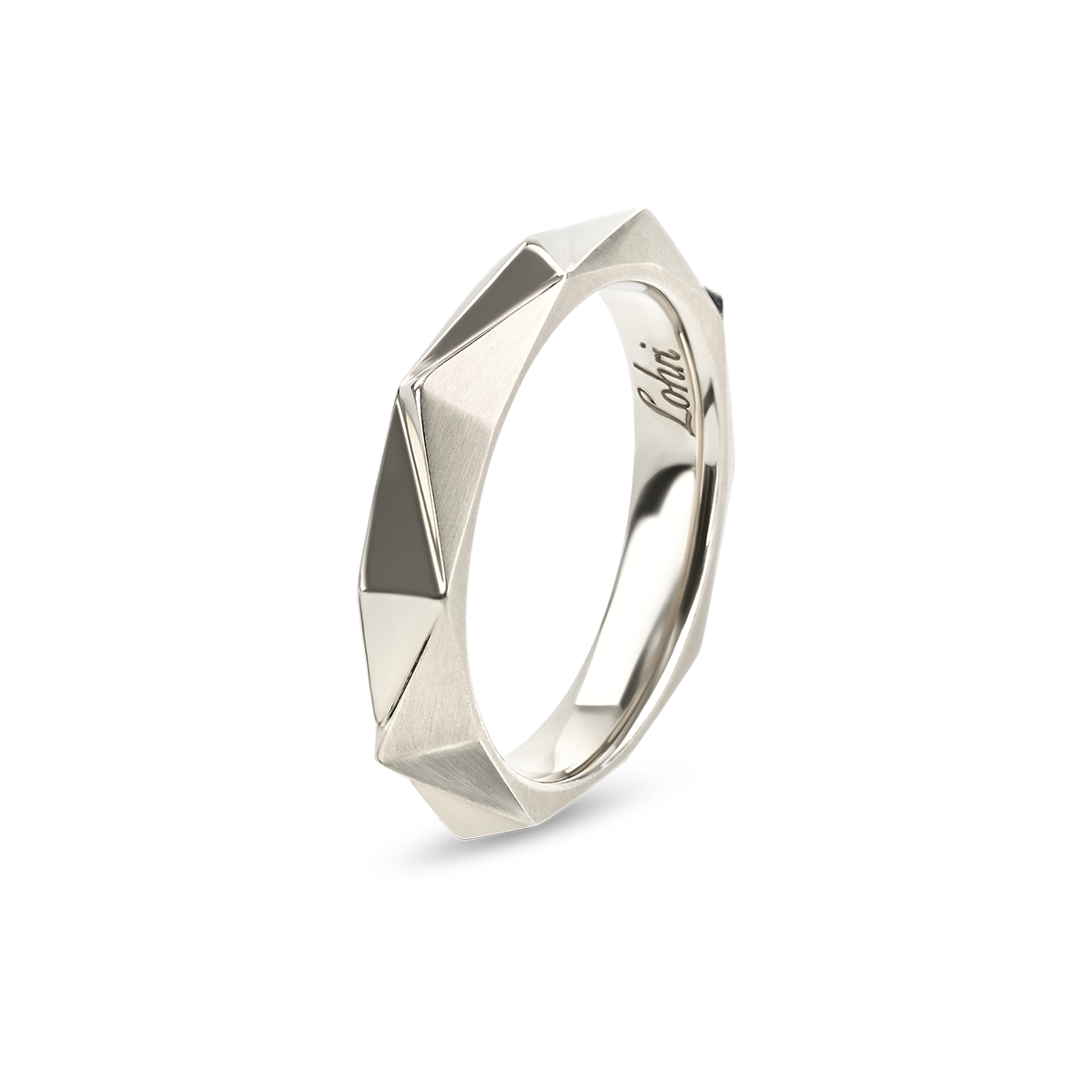 The Chiliagon collection combines bold shapes with timeless elegance. Inspired by avant-garde architecture, these pieces of jewellery mesmerizingly reflect the light, unfolding their captivating effect. This one-of-a-kind ring is handcrafted in white gold and features a combination of matte and polished facets.