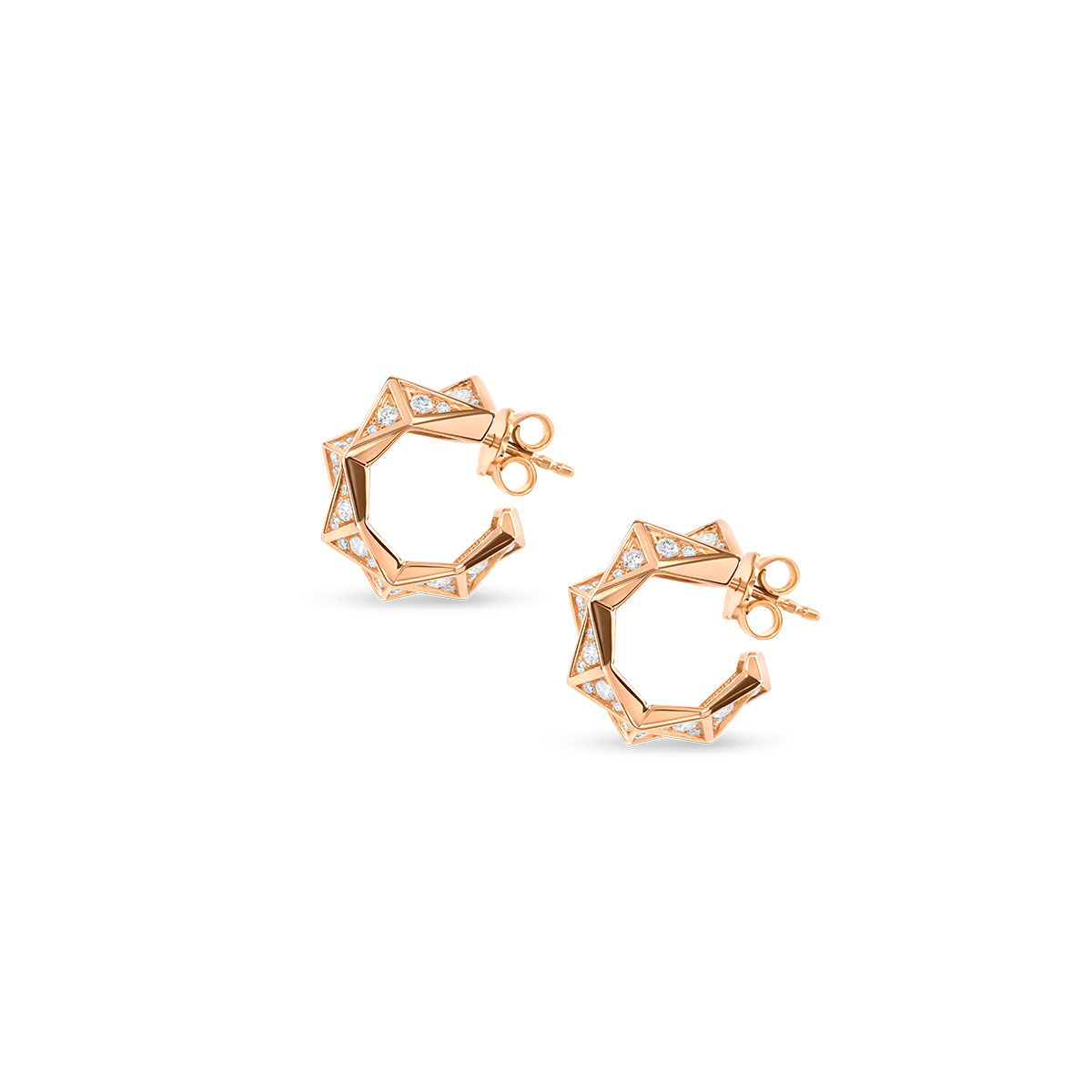 The Chiliagon collection is compelling and elegant. Inspired by avant-garde architecture, these pieces of jewellery mesmerizingly reflect the light. A chiliagon has 1000 facets, just like you do. These hoop earrings are handcrafted in red gold featuring asymmetrical facets and set with carefully selected brilliant-cut diamonds.