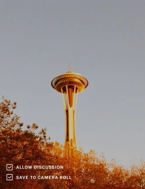 VSCO option to 'Allow Discussion' selected on photo of Seattle Space Needle in golden lighting