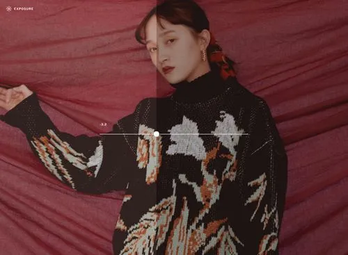 VSCO Exposure tool slider showing darkening of portrait image of woman in a sweater with red background