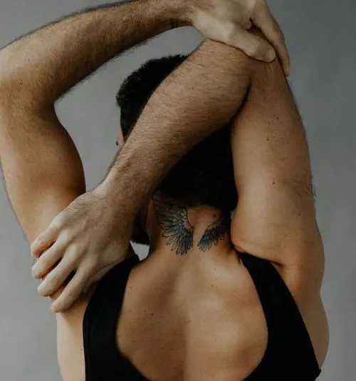 Dancer reaching hands behind head taken and shared with a client photo gallery on VSCO