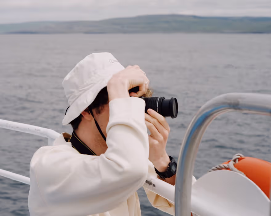 Photographer on a boat