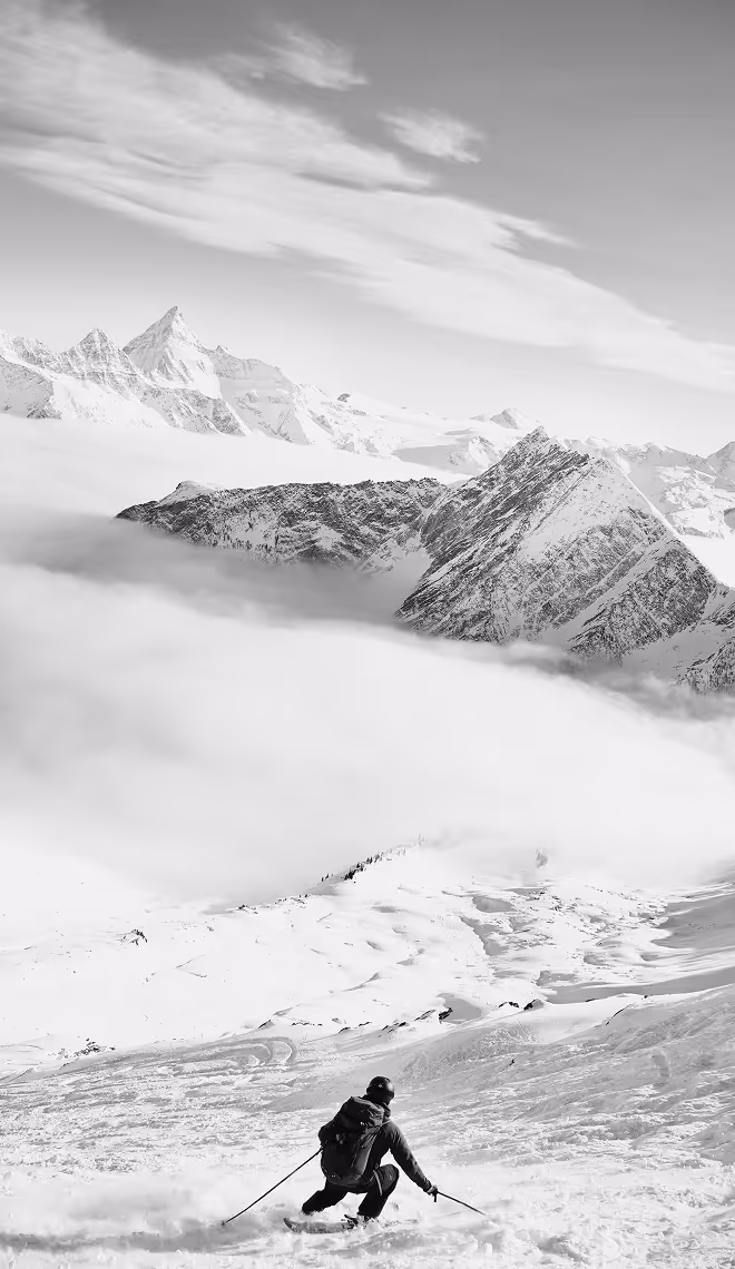 Black and white photo filter on mountain skier photo