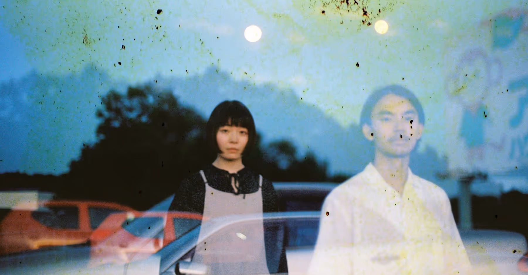 Grunge textured overlayed on photo of two people